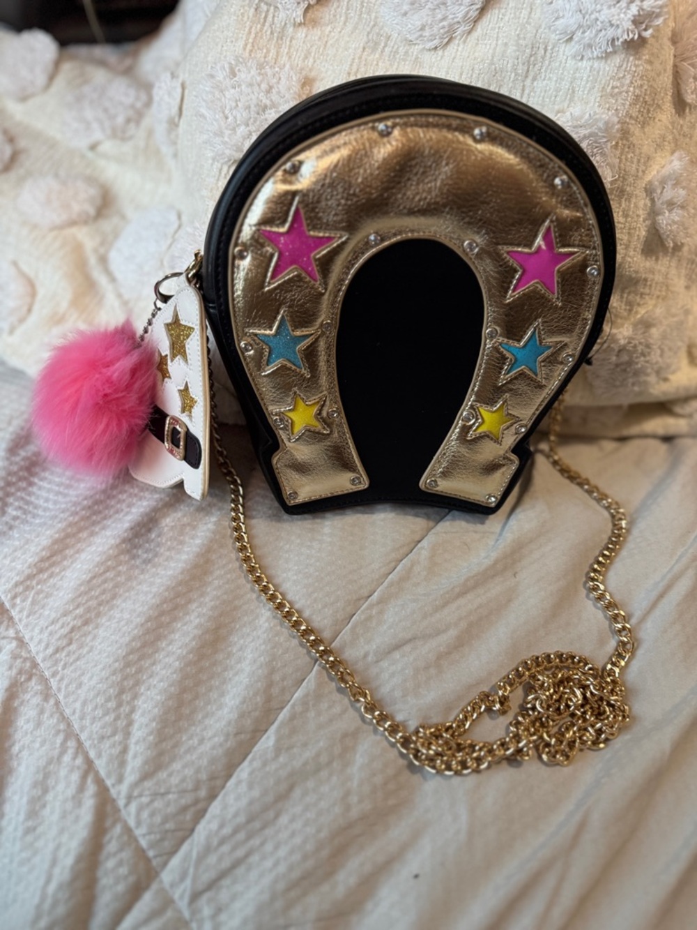 Betsey Johnson Black & Gold Horseshoe Crossbody with Pink Pom Get ‘Em Cowgirls